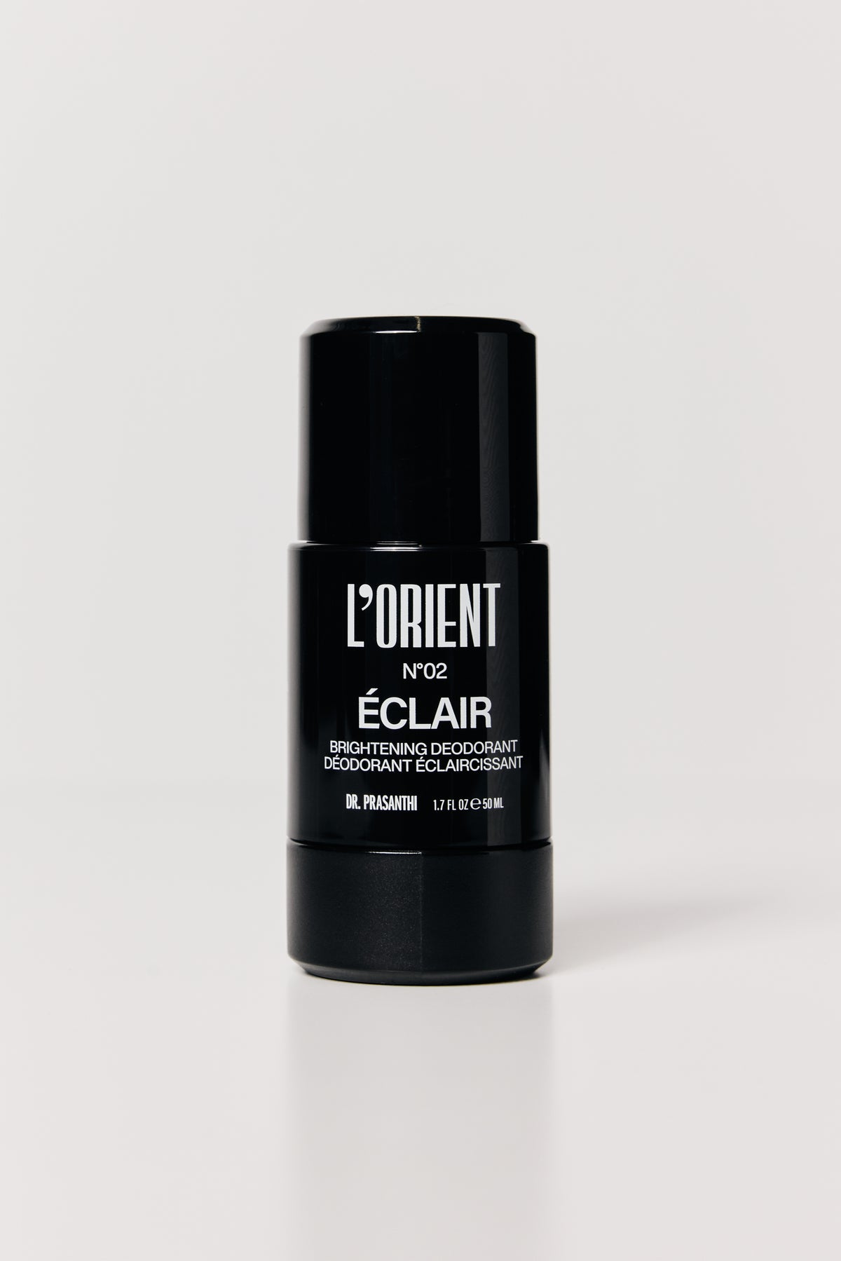Éclair brightening deodorant standing on a light grey background